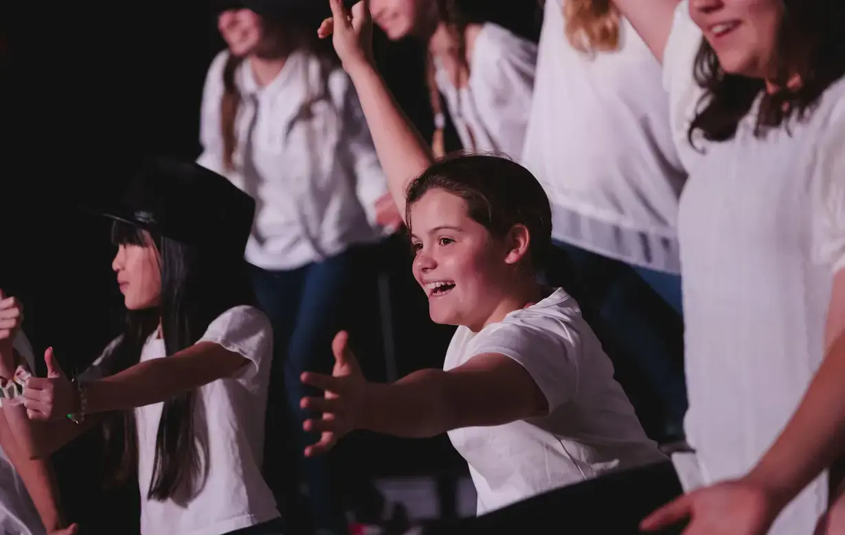 Trinity Lower School students performing show on stage