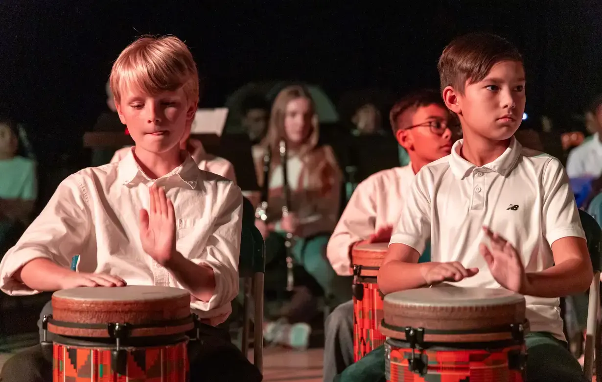 Trinity Lower School students playing drums