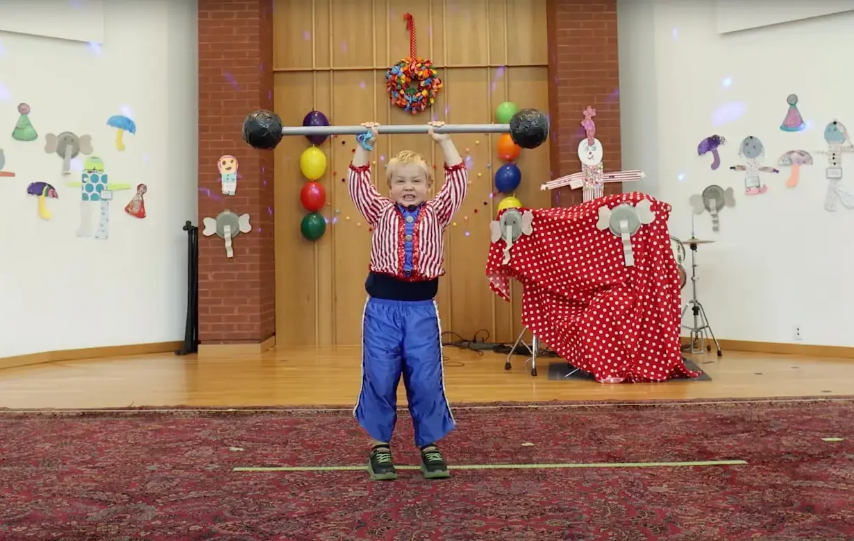 Trinity School Transitional Kindergarten Young Performer at School Show Lifting Weights