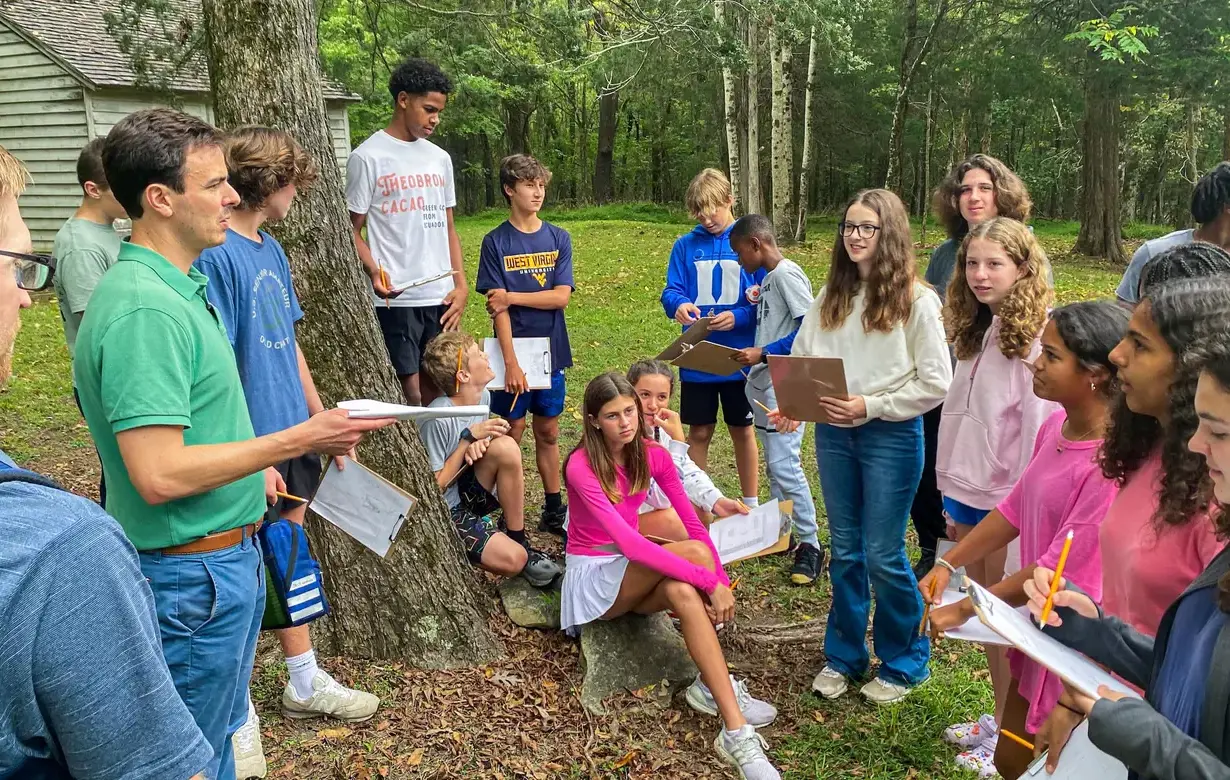 Group of Middle School students studying outside