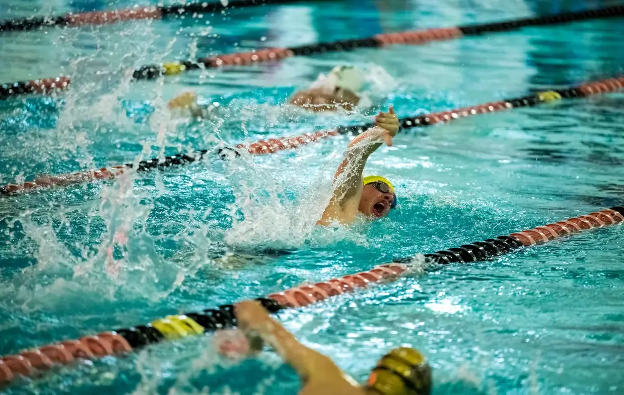 Male student swimming