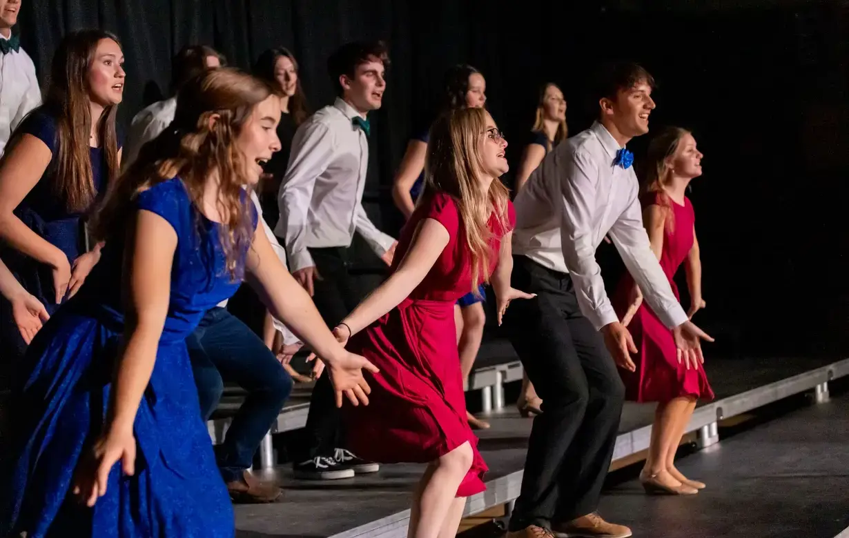 Students performing on stage