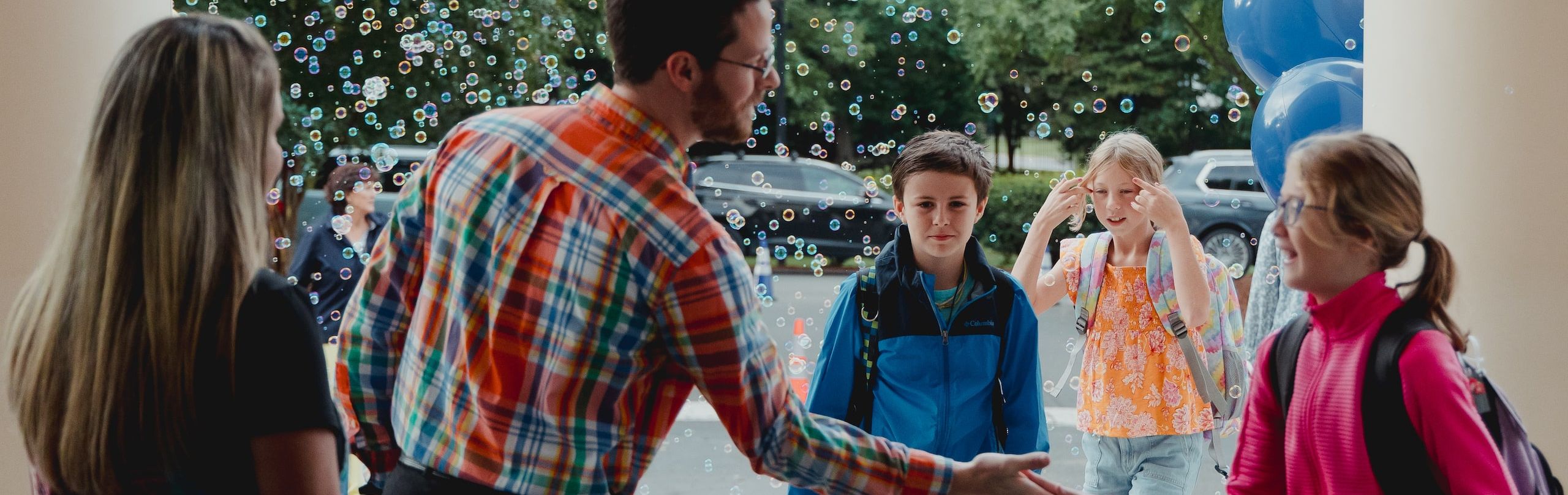 Faculty welcoming students on first day