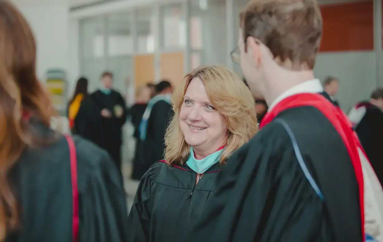 Faculty member wearing ceremonial gown